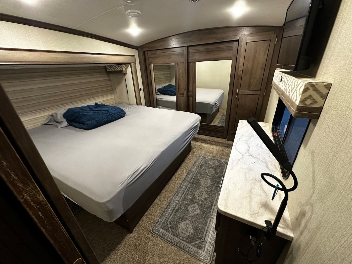 The RV bedroom with a king-size bed